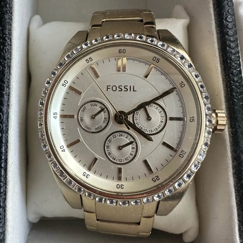 Gold fossil watch